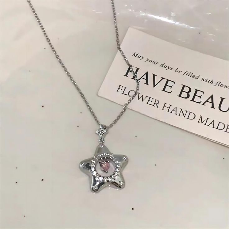 Description:Chic Heart Star Necklace Specifications:Material: cubic zirconia, copper,18k silverColors: silverSize: 40 cm + 5 cm extWeight: 26 g/pcs "Add some stylish ✨ and 💖 to your look with our Chic Heart Star Necklace. This necklace will be the perfect addition to any outfit, bringing a touch of playfulness and charm. Show off your unique and fun side with this must-have accessory. (No, seriously. It's a must-have.)" Winter Bracelet, Wedding Banquet, Star Design, Positive Messages, Different Outfits, Crystal Heart, Star Necklace, Star Designs, Costume Party