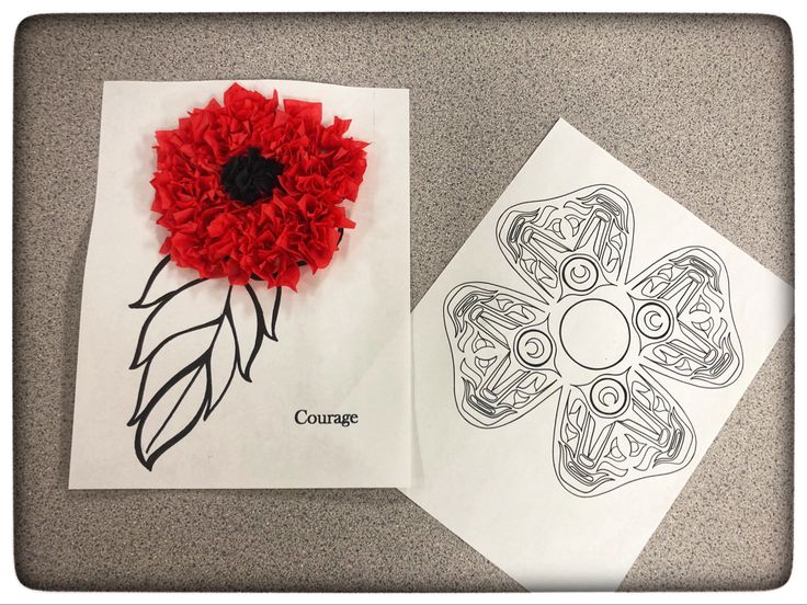 two paper flowers on top of each other next to some coloring pages with the word courage written in it