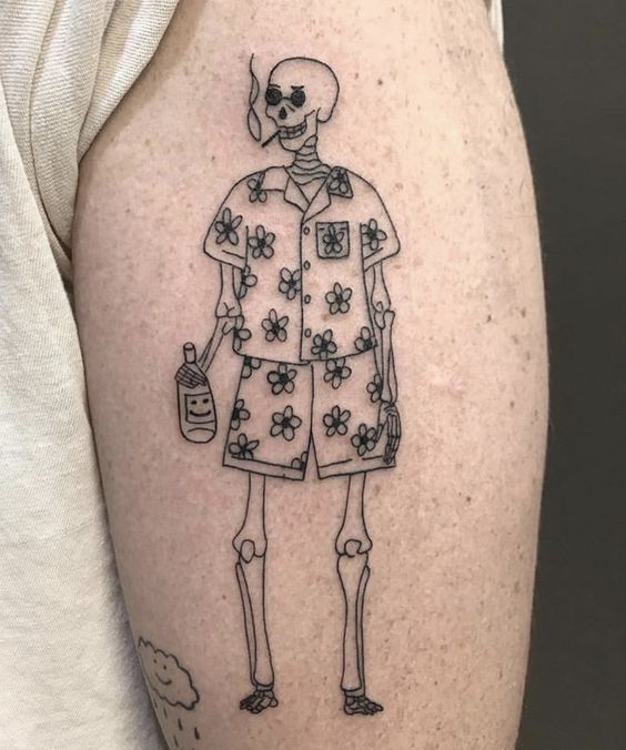 a person with a skeleton tattoo on their arm holding a bottle and wearing a shirt