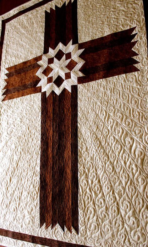 a quilt made to look like a cross