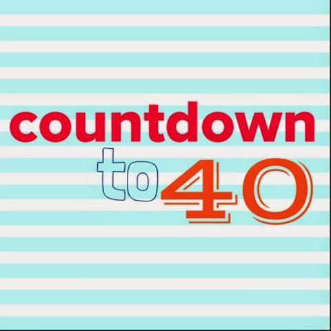 the words countdown to 40 are displayed on a blue and white striped background with an orange font