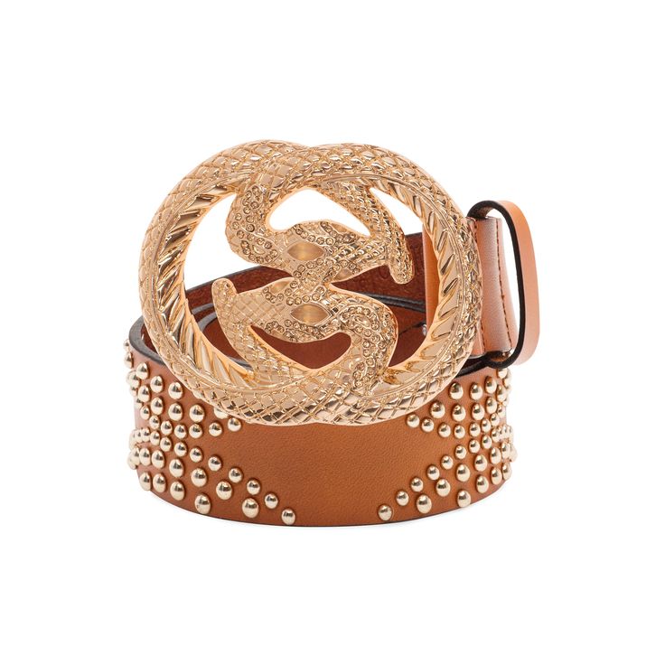 Color: Camel Embellished with a gold snake belt buckle, the Snake Glam Belt adds a hint of glitz to any outfit. This brown studded belt is made from full grain leather and features a series of small domed studs on the strap and an intricate snake buckle that adds one-of-a-kind style. The neutral camel hue makes it perfect for wearing in any season. Details: ﻿100% genuine full grain leather 1.5 inches(3.81cm) wide Zinc alloy buckle Gold colored metal detailing on the belt Beautiful packaging Free Luxury Adjustable Gold Belt Buckle, Luxury Gold Adjustable Belt Buckle, Trendy Gold Leather Belt Buckles, Designer Belt Buckles For Party, Designer Gold Belt For Party, Fall Belts, Jeans And Shirt, Snake Leather, Studded Belt