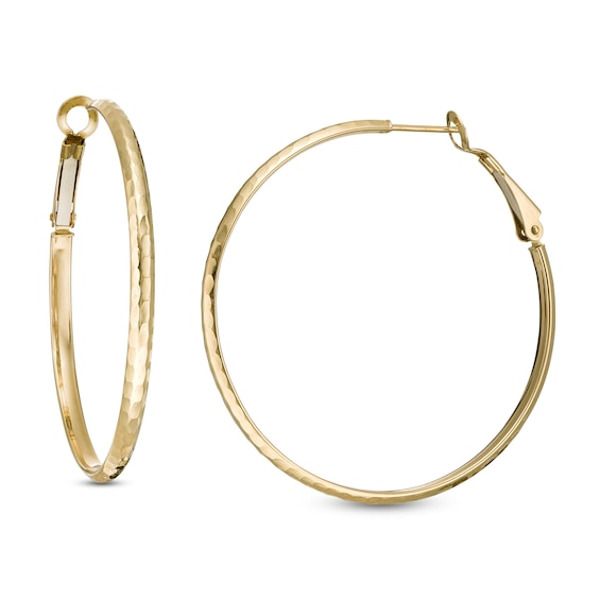 These 44.7 x 3.1mm hoop earrings are fashioned in 14K gold with a hammered finish and secure with omega backs. Yellow Gold Hammered Metal Hoop Earrings, Small Hammered Hoop Earrings For Formal Occasions, Modern Hammered Hoop Earrings For Formal Occasions, Modern Hammered Hoop Earrings For Formal Events, Elegant Hammered Hoop Earrings, Elegant Hammered Round Hoop Earrings, Formal 14k Gold Hammered Hoop Earrings, Modern 14k Gold Hammered Hoop Earrings, Formal Hammered 14k Gold Hoop Earrings