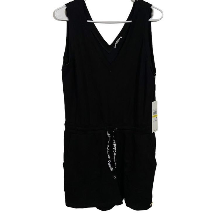 Nwt Women’s Size Medium Calvin Klein Black Sleeveless V-Neck Romper. Elastic Gathered Drawstring Waist, Midi Length Shorts. Comes From A Smoke Free Home, Bundle With Other Items To Save & Minimize Shipping Cost. Casual V-neck Vest For Loungewear, Casual Sleeveless Tank Top By Calvin Klein, Casual Calvin Klein Sleeveless Tank Top, Calvin Klein Casual Sleeveless Tank Top, Casual Stretch Calvin Klein Tank Top, Calvin Klein Stretch Tank Top, Calvin Klein Summer Loungewear Tops, Calvin Klein Casual Summer Tank Top, Chic Calvin Klein Jumpsuits And Rompers For Summer