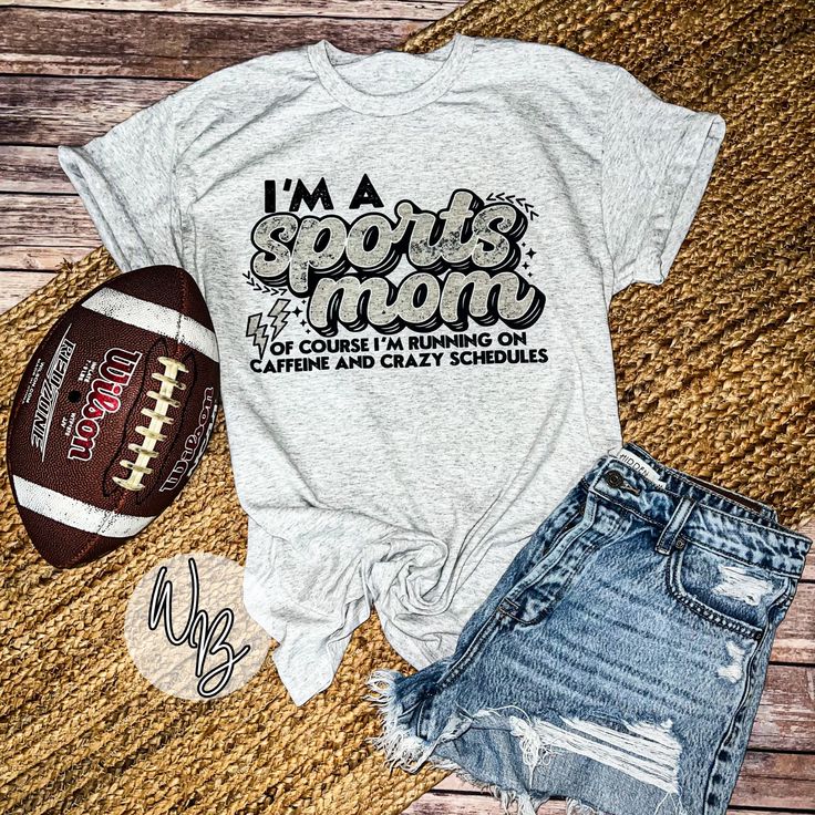 Calling all Sports Mamas! Super soft short sleeve shirt. Perfect for a day to day fit, especially out there rootin for your kiddos! Also makes perfect gifts! Shirt Color: Ash Gray (Shirt colors can be customized-Please message me with any requests) Sizing for the shirts are unisex and true to size. Shirt material is cotton/polyester blend. This design is made with an ink that dyes the fabric. No Vinyl or Screenprint. It has no feel to it, and will hold up wash after wash as long as washing instructions are followed. The vibrancy of the ink on the shirt has more of a vintage appearance. Shirt Wash Care Instructions: Wash inside out with cold water No fabric softener Do not bleach Do not dry clean Do not iron over design Tumble dry low heat All Sales are Final. No returns or exchanges accept Mom Sports Shirts Ideas, Athletic Fit T-shirt With Letter Print For Sports Season, Short Sleeve Tops With Lettering For Sports Events, Sports Mom Shirts Ideas, Sporty Tops With Lettering For Sports Season, Relaxed Fit Tops For Football Season, Team Spirit Short Sleeve Activewear For Sports Events, Sportswear T-shirt With Team Name For Game Day, Sports Event Lettering T-shirt With Short Sleeves