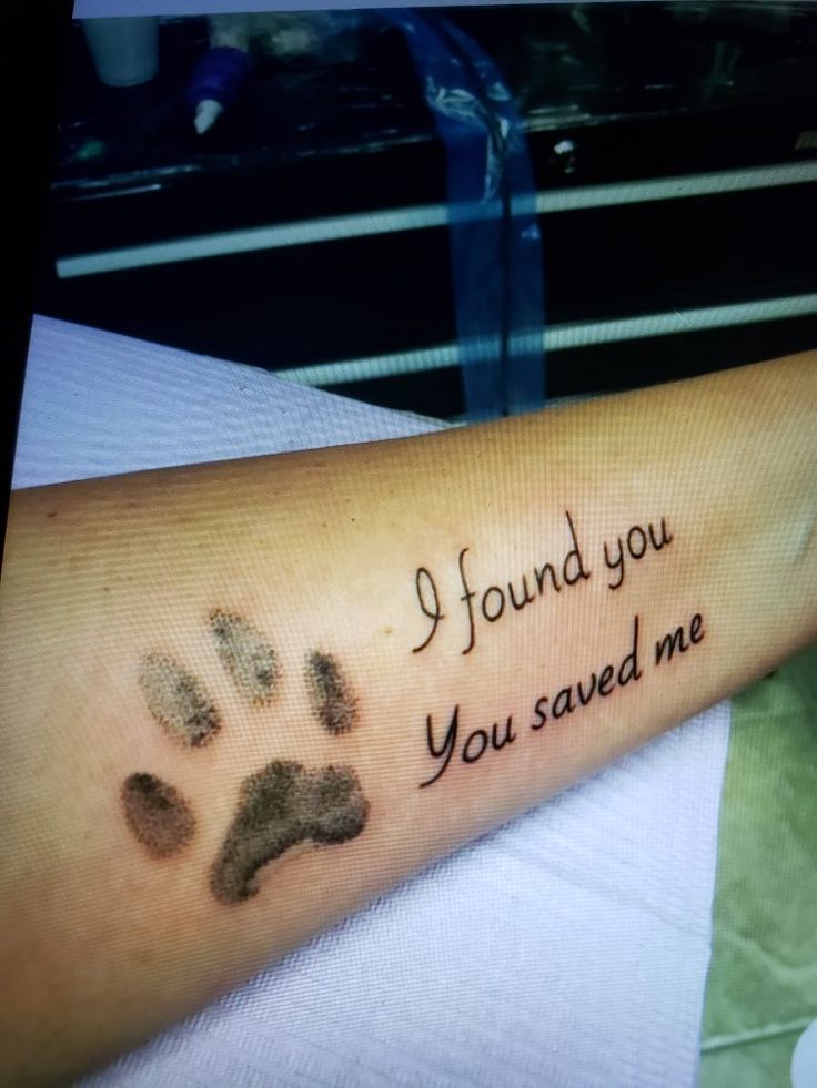 a person with a tattoo on their arm that says, i found you you saved me