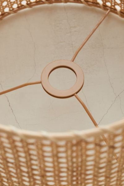 the inside of a wicker basket with a ring on it