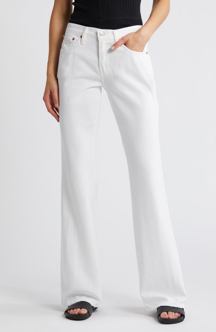 Effortlessly cool and laid-back, these slouchy, full-length bootcut jeans are made from lightweight, flowy denim in a bright-white wash. 33 1/2" inseam; 20" leg opening; 10" front rise; 13 1/2" back rise (size 29) Button fly Five-pocket style 75% cotton, 25% lyocell Machine wash, tumble dry Imported Modern Straight Hem Summer Jeans, White Full-length Jeans For Workwear, Chic Summer Jeans With Straight Hem, White Full-length Jeans For Work, Summer Chic Jeans With Straight Hem, White Flare Denim Jeans, Chic Straight Hem Summer Jeans, White Full-length Cotton Flare Jeans, White Full Length Jeans For Work