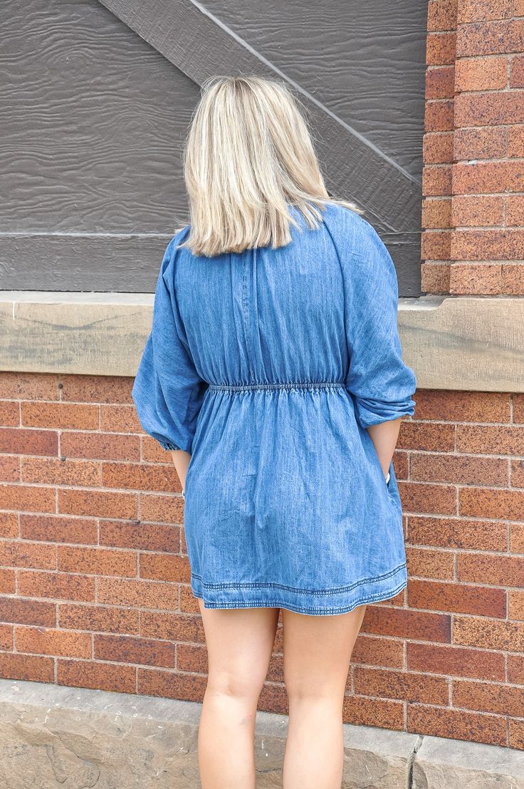 Elevate your denim game with our Pretty Puff Sleeve Denim Dress, a delightful fusion of casual comfort and feminine charm. Crafted from premium denim fabric, this dress effortlessly combines classic style with on-trend details for a look that's both timeless and fashion-forward. The star of the show? Those adorable puff sleeves! Adding a touch of romance and whimsy, these voluminous sleeves are sure to make a statement wherever you go. They're perfectly balanced by the structured yet relaxed sil Chic Washed Blue Denim Dress, Medium Wash Puff Sleeve Denim Top For Summer, Summer Medium Wash Denim Top With Puff Sleeves, Medium Wash Denim Top With Puff Sleeves For Summer, Fall Denim Blue Mini Dress With Pockets, Denim Blue Mini Dress With Pockets For Fall, Fall Relaxed Fit Denim Blue Denim Dress, Casual Cotton Puff Sleeve Dress For Brunch, Light Wash Chambray Denim Dress For Fall