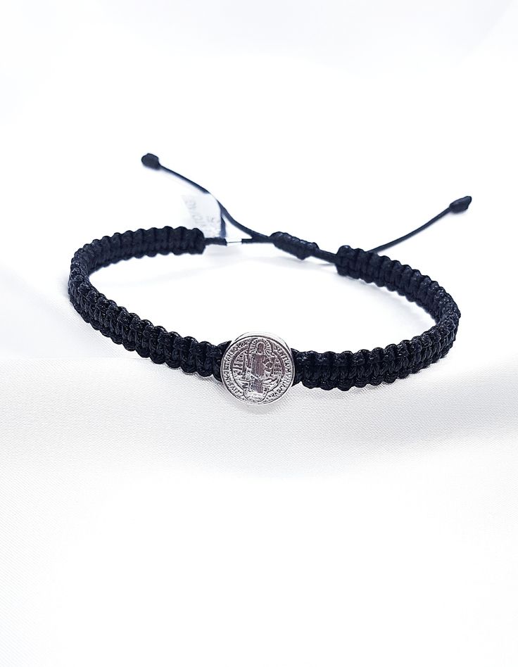 Sterling silver Saint Benedict Bracelet Black cord bracelet Silver St Benedict Medal Adjustable The diameter of the medal: 1 cm Check out our other items in Boutique Medjugorje store: https://boutiquemedjugorje.etsy.com Spiritual Sterling Silver Braided Bracelet, Handmade Sterling Silver Friendship Bracelets In Silver, Nickel-free Sterling Silver Friendship Bracelets, Spiritual Sterling Silver Braided Bracelet Gift, Adjustable Silver Braided Bracelet With Sterling Clasp, Adjustable Sterling Silver Braided Bracelet, Nickel-free, Adjustable Sterling Silver Rosary Bracelet, Black Sterling Silver Bracelets With Adjustable Cord, Black Sterling Silver Bracelet With Adjustable Cord