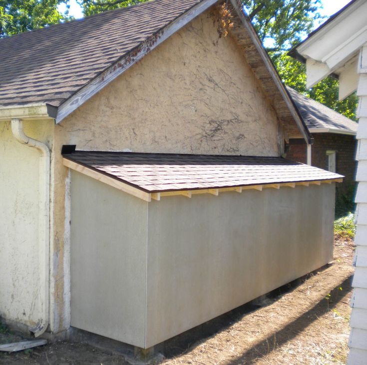 an old house with a roof that has been gutted