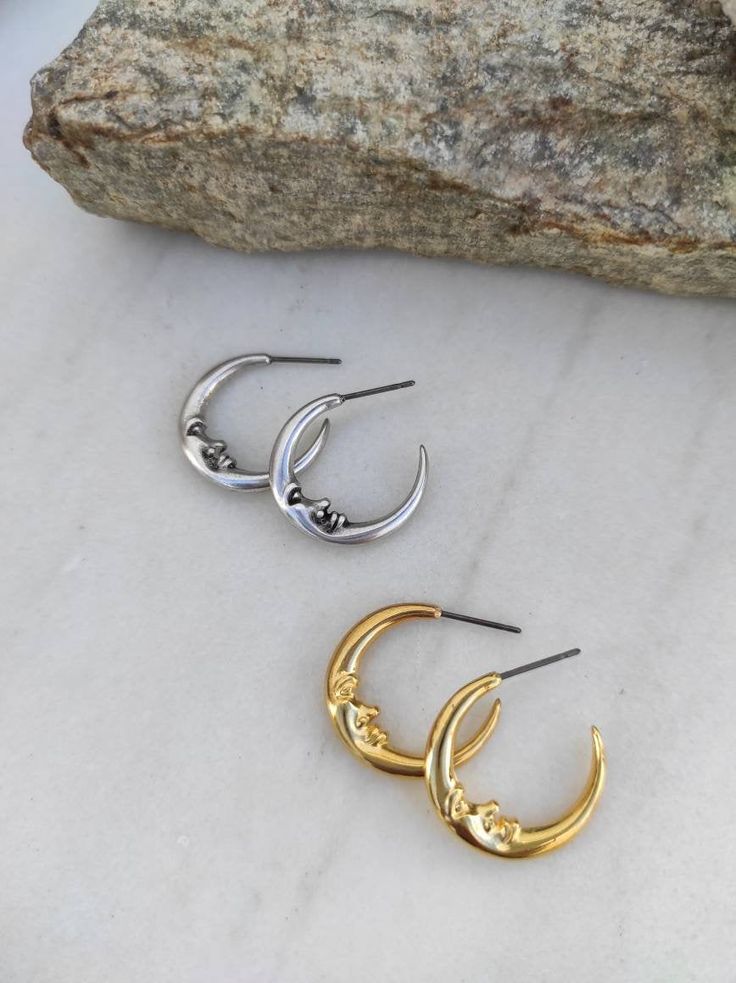 Moon hoop earrings moon earringscrescent moonmoon jewellerysailor moonhoops with moongold moon hoopssilver moon hoopslunar jewelrymoon phase earringshuggie hoop earringscelestial jewelrywitch earringsBohemian earrings gold earrings silver earrings You can choose between 925 silver plated or 24k gold plated. They are very light and comfortable! Plus they are anti allergic/ nickel free ❤ Dimensions: Crescent moon size: 2.4cm/0.94 inches You can find more handmade stud earrings here https://www.ets Silver Crescent Minimalist Hoop Earrings, Silver Crescent Cartilage Earrings With Moon Charm, Sterling Silver Crescent Cartilage Earrings With Moon Charm, Nickel-free Moon Shaped Hoop Earrings, Small Silver Hoop Earrings With Moon Charm, Silver Small Hoop Earrings With Moon Charm, Nickel-free Moon-shaped Hoop Earrings, Nickel-free Moon-shaped Metal Hoop Earrings, Silver Moon Charm Earrings For Everyday