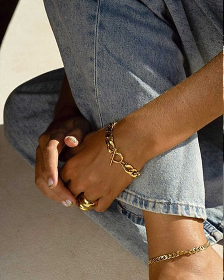 This chunky gold bracelet features a prominent, 1 cm wide cuban chain and trendy toggle closure. Free shipping. Easy returns. How To Style Pearls, Chunky Gold Bracelet, How To Clean Gold, Chunky Pearl Necklace, Chunky Pearls, Mens Bracelets, Chunky Bracelet, Chunky Chain Necklaces, Bracelet Minimalist