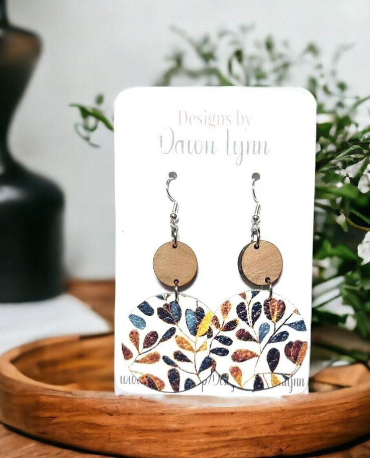 "Size  options  1\" or 1.25\" cork on leather design (1.25 shown in photo) The fun cork on leather design adds a unique touch to these earrings, making them stand out from the crowd. The cherry wood accent adds a touch of natural beauty, effortlessly complementing any outfit. The lightweight construction ensures comfort throughout the day or night. The versatile design of these earrings makes them a fantastic gift option for friends, family, or even yourself. Show off your exceptional style with Floral Circle, Earrings Making, Clear Plastic Bags, Wood Accent, Gilbert Az, Earring Ideas, Large Earrings, Small Earrings, Display Cards