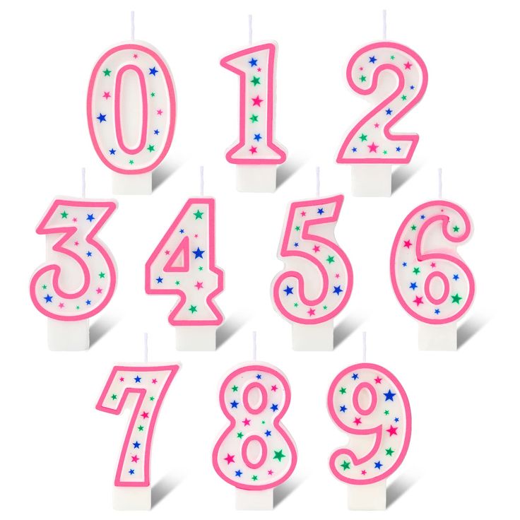 birthday candles with numbers and stars in pink, white and blue colors on top of each candle