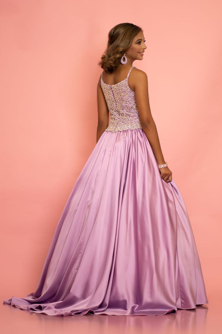 Sugar Kayne C134 by Johnathan Kayne Girls and Preteens long pageant gown with stone encrusted bodice with and embellished spaghetti straps. The full ballgown skirt is made of Duchess Satin and has a sweeping train. Available colors: Orchid Available sizes: 12 (Sizes 2-6 do not have bust cups, Sizes 8-16 will have preteen size bust cups) Ballgown Skirt, Johnathan Kayne, Pageant Gown, Satin Evening Gown, Dress Ball Gown, Duchess Satin, Ball Gown Skirt, Pageant Gowns, Pageant Dress