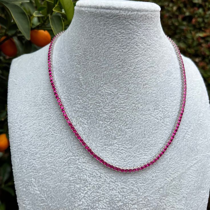 New in! Beautifully crafted round cut 3 mm cz diamonds dark pink tennis necklace made from sterling silver Measures 16 inches in length GAN0103 Luxury Elegant Pink Tennis Necklace, Classic Diamond Tennis Necklace With Gemstones, Ruby Tennis Necklace, White Gold Ruby Necklace With Diamond Cut, White Gold Ruby Necklaces With Brilliant Cut, White Gold Ruby Necklace With Brilliant Cut, Silver Cubic Zirconia Single Strand Tennis Necklace, Silver Single Strand Cubic Zirconia Tennis Necklace, Formal Cubic Zirconia Tennis Necklace With Gemstones