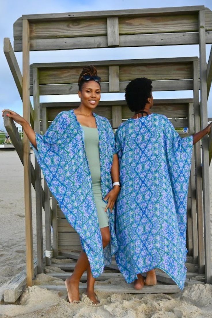 Luxurious and lightweight, soft and shear, wear it as a beach coverup. With the self tie belt, it doubles as an easy wrap dress, perfect for sunset cocktails. Dress it up with jeans and boots or let it hang as a luxurious duster for when you snuggle up on the couch. Feel gorgeous on all occasions. Spring Loungewear Wrap Kaftan, Vacation Rayon Cover-up, Flowy Tunic Kimono For Loungewear, Bohemian Fitted Dress For Loungewear, Fitted Bohemian Dresses For Loungewear, Summer Maxi Length Robe For Loungewear, Flowy Kimono Sleeve Tunic For Loungewear, Flowy Cover-up With Kimono Sleeves For Loungewear, Flowy Loungewear Dresses