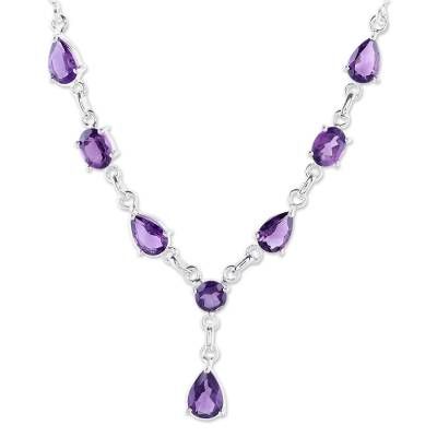 Suitable for royalty this amethyst Y necklace from Alok Jain in India is truly breathtaking. The artisan sets over 5 carats of the faceted lilac gems in polished sterling silver in this classically elegant design..925 Sterling silver Formal Fine Jewelry Amethyst Necklaces, Formal Fine Jewelry Amethyst Necklace, Formal Amethyst Necklace In Fine Jewelry Style, Elegant Amethyst Pendant Necklace, Elegant Purple Amethyst Necklace, Elegant Purple Teardrop Gemstone, Elegant Amethyst Jeweled Necklaces, Elegant Amethyst Jewel Necklace, Formal Purple Gemstone Necklace