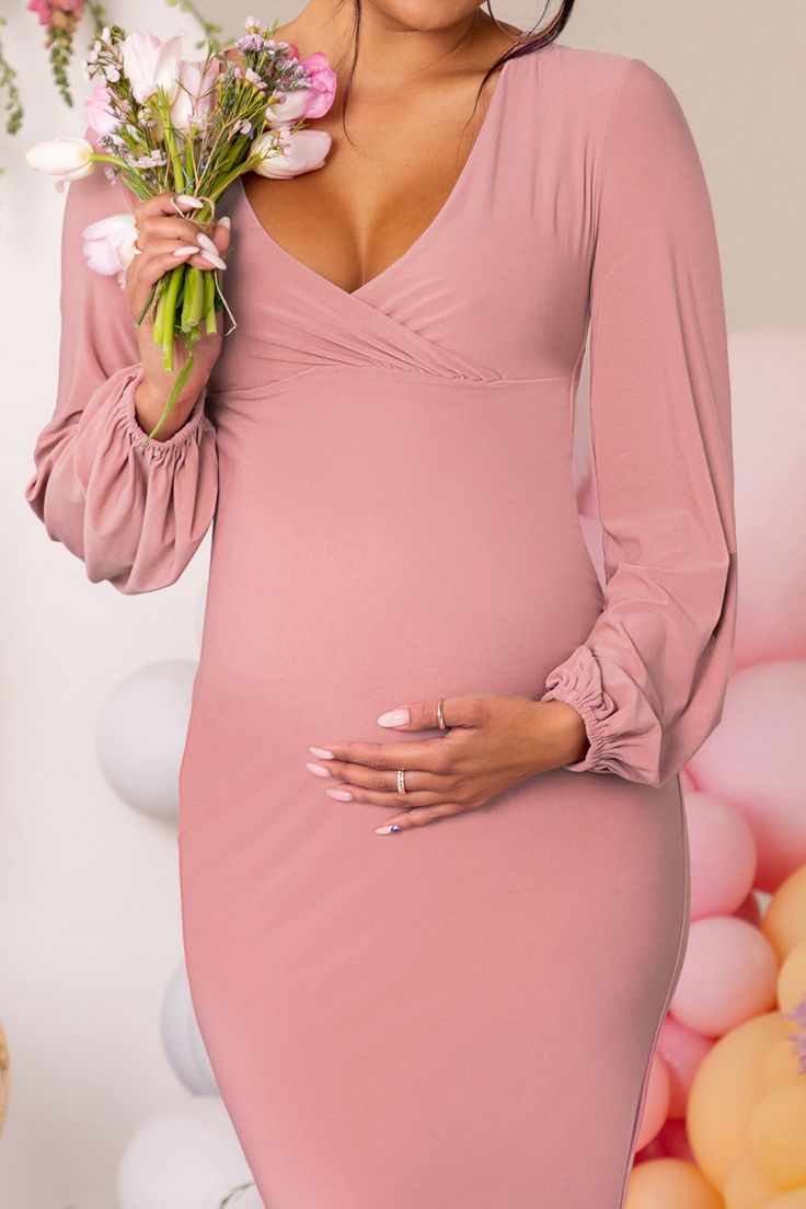 Maternity dresses never looked so good! Meet our stunning ''Mum To Be'' maxi dress. Feel effortlessly gorgeous with its elegant balloon long sleeves with a daring V neckline and a beautiful cascade hemline. Crafted from premium stretch jersey for maximum comfort. this maxi will bring all eyes on you. babe!Features- Balloon long sleeve detail- V neckline- Cascade hemlineSizingModel is 5'9 and wears UK size 8 / US size 4Fit InformationMade from Jersey (95% Polyester 5% Elastane)Total length from t Maternity V-neck Ruched Dress, Maternity V-neck Dress With Ruched Details, V-neck Ruched Maternity Dress, Party Maxi Dress With Bishop Elastic Sleeves, Maternity Long Sleeve Maxi Dress For Fall, Maternity Maxi Dress With Long Sleeves For Fall, Long Sleeve Maternity Maxi Dress For Fall, Feminine Long Sleeve Maxi Dress With Gathered Sleeves, Elegant Long Sleeve Maxi Dress For Maternity