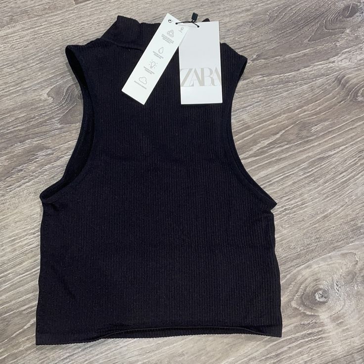 Nwt Zara High Neck Black Top Sleeveless Ribbed, Stretchy Material Never Worn Zara Fitted Crop Tank Top, Fitted Zara Crop Top Tank Top, Fitted Seamless Zara Crop Top, Fitted Black Ribbed Vest, Zara Sleeveless Black Crop Top, Black Ribbed Tank Vest, Black Ribbed Sleeveless Vest, Black Sleeveless Ribbed Vest, Zara Black Stretch Crop Top