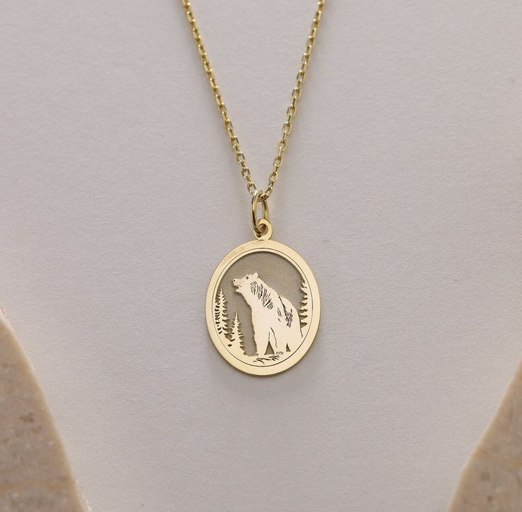 Gold Mountain Bear Pendant - Bear Gold Necklace ● Material of pendant: Solid Gold 14k ( REAL GOLD ) ● Metal Stamp: 14k ( REAL GOLD ) ● The pendant is available in 5sizes: - 12x17 mm / 0,47 x 0,66 inches - 13x18 mm / 0,51 x 0,70 inches  In the photos - 14x19 mm / 0,55 x 0,74 inches  - 16x21 mm / 0,62 x 0,82 inches  - 18x24 mm / 0,70 x 0,94 inches ( In the photos the size is 13x18 mm / 0,51 x 0,70 inches ) ( Jump Ring inner diameter: 4 mm ) ● Material of chain: Solid gold 14k ( REAL GOLD ) It is t 14k Gold Oval Pendant Charm Necklace For Gift, Yellow Gold Oval Charm Necklace As Gift, Yellow Gold Oval Charm Necklace Gift, Yellow Gold Pendant Necklace As Gift, Yellow Gold Pendant Necklace For Gift, Yellow Gold Jewelry With Hallmark For Birthday, Yellow Gold Necklaces With Hallmark For Birthday Gift, Engraved Yellow Gold Necklace For Birthday, Engraved Yellow Gold Custom Necklace For Birthday