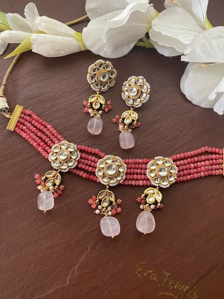 Elegant and delicate Indian Necklace With Gold Plating. Indian Bridal Kundan set One Gram Jewelry Choker Set. Very Gorgeous and pretty, fine Kundan choker necklace with matching earrings Adjustable length with help of dori (cord) Ready to ship from NJ, United States Gorgeous 24 K gold plated. Pink Round Kundan Necklace For Diwali, Traditional Pink Kundan Necklace Gift, Traditional Pink Necklace For Diwali, Traditional Handmade Pink Bridal Necklace, Pink Kundan Necklace For Festivals, Handmade Pink Kundan Necklace For Wedding, Pink Tilla Necklace For Diwali, Pink Tilla Necklaces For Diwali, Pink Meenakari Bridal Necklace For Festive Occasions