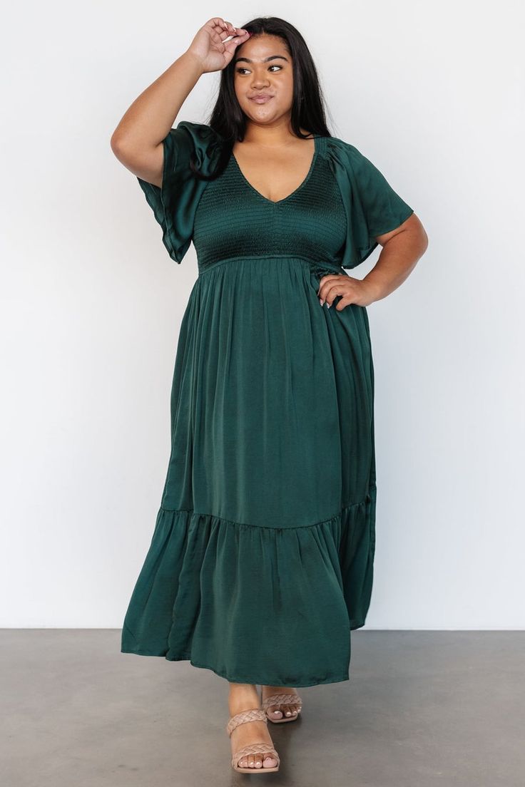 Our Lovell Smocked Midi Dress in Copper is a beautiful staple dress for your wardrobe! This pretty dress can be dressed up or dressed down! The perfect dress for any occasion! Green V-neck Maxi Dress With Smocked Back, Green Smocked Dress With Short Sleeves For Brunch, Green Smocked Short Sleeve Dress For Brunch, Flowy Green Smocked Dress With Ruffles, Green Flowy Smocked Dress With Ruffles, Green V-neck Midi Dress With Smocked Bodice, Flowy Green Ruched Midi Dress, Green Midi Dress With Ruffle Hem, Green Midi Smocked Dress With Smocked Cuffs