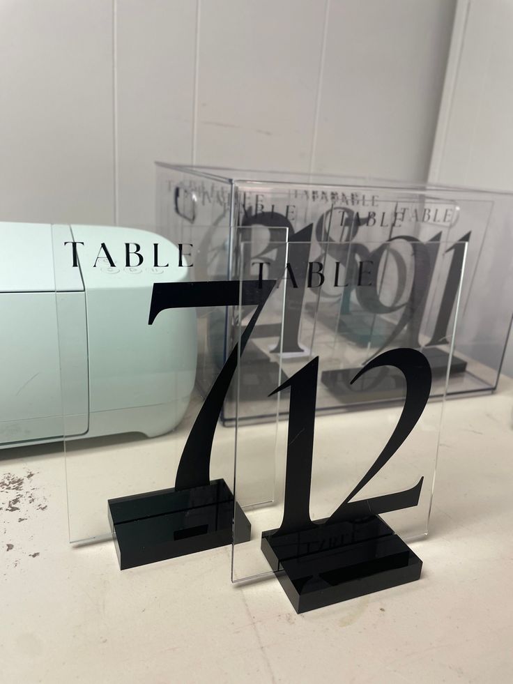 the number twenty twelve is displayed in front of a mirror