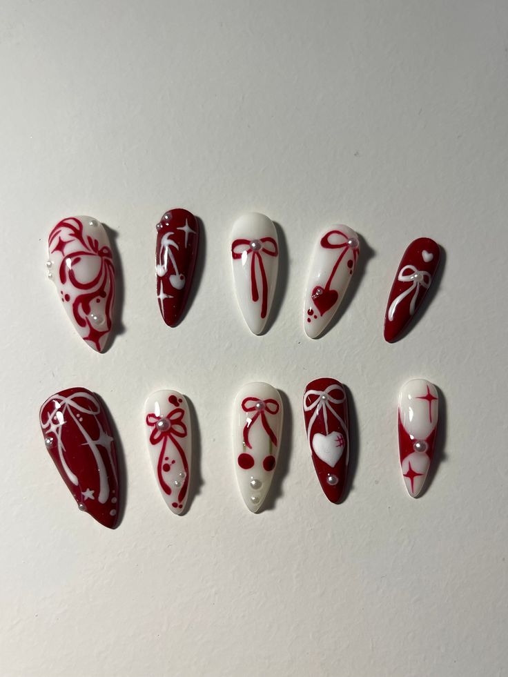 --> Nail shape + length: medium stiletto 🌸 ** if you want a different shape, make sure to include it in the personalization section 🎀All orders ship with a file, nail glue, cuticle pusher and stickers :D 🎀If you need custom sizes make sure to include it in the personalization section!! **there might be slight differences in the nail art as they are a handmade product** IG: @stxrnails Red Nails Alternative, Sultry Red Nails, Read Nails Design, Chinese Halloween Nails, Red Nail Fall Design, Nail Inspiration Red And Black, Red Detailed Nails, Y2k Nails Christmas, Red White Nails Acrylic