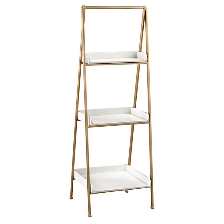 three tiered shelf with white shelves on each side and gold metal frame, against a white background