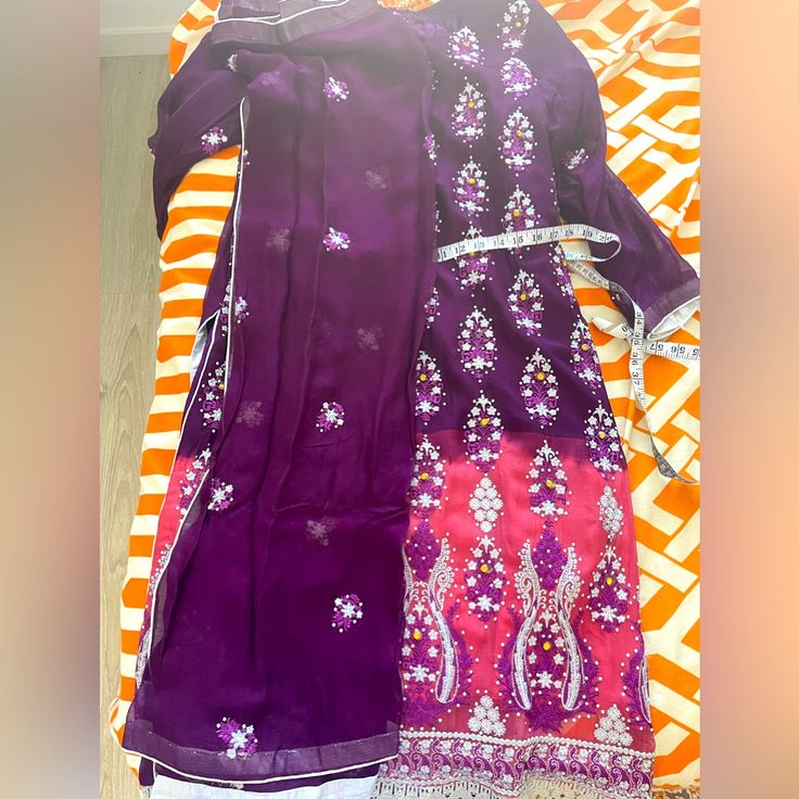 18 Chest. Brand New. Perfect For Eid. Comes With Shalwar And Dupatta Purple Long Sleeve Sets With Mirror Work, Semi-stitched Purple Kurta With Mirror Work, Purple Semi-stitched Kurta With Mirror Work, Purple Sharara For Diwali Celebration, Elegant Semi-stitched Purple Sets, Purple Long Sleeve Sets With Self Design, Purple Salwar Kameez With Zari Work For Diwali, Designer Purple Kurta With Mirror Work, Purple Designer Kurta With Mirror Work