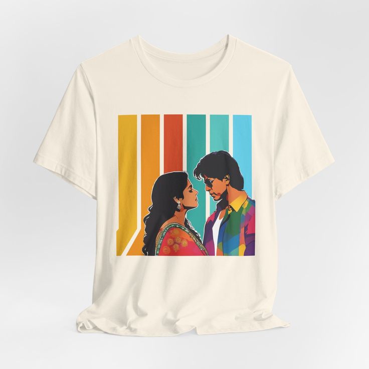 Bollywood Desi Shirt | This Unisex Indian T-Shirt gives Filmy vibes from the 90s if you know what I mean! Whether you're pairing it with your favorite jeans, leggings, or a flowing skirt, this T-Shirt effortlessly elevates your everyday look. This is a Relaxed Fit Tee and has a unisex style that runs a touch small for men, and about a half a size large for women. It is soft and cozy. The last photo shows measurements! Looking for some more desi novelties? Check out boomju.etsy.com 90s Inspired Multicolor Letter Print Tops, Pride Graphic Print Relaxed Fit T-shirt, Pride Graphic Print Short Sleeve T-shirt, White Retro Print T-shirt For Streetwear, 90s Inspired Graphic Print T-shirt For Fans, Multicolor Retro Print Graphic Tee, 90s Style Multicolor Tops For Fan Merchandise, 90s Style Multicolor Screen Print Tops, 90s Style Cotton T-shirt With Retro Print