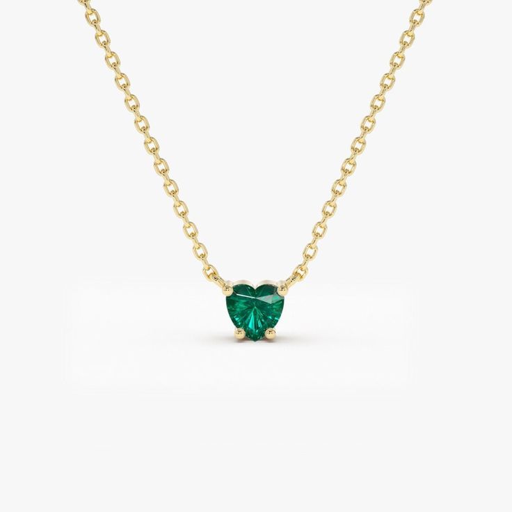 "Heart-Shape Emerald Necklace / 14k Solitaire Heart Emerald Pendant / 14k Gold Layering Emerald Necklace by Ferkos Fine Jewelry May Birthstone * Made to Order * Gold Kt: 14K (also available in 18K) * Available Gold Color: Rose Gold, Yellow Gold, White Gold * Heart Shape Emerald: 1 pc 4x4 MM * Emerald Carat Weight: 0.30 ctw * Ready to ship in 7-10 Business days If you have any additional questions about this ring, just hit the \"Message Ferko\" button and we will get back to you within a few hour Shared Prong Wedding Band, Gold Armband, Heart Shaped Necklace, Emerald Pendant, May Birthstone, Emerald Necklace, Ruby Jewelry, Emerald Jewelry, Sapphire Jewelry