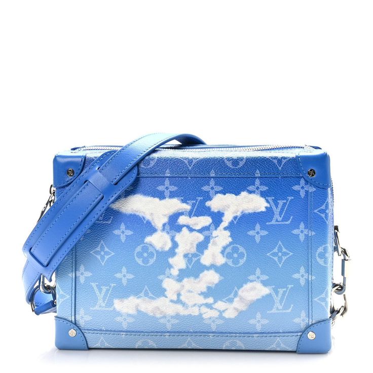 Louis Vuitton Monogram Clouds Soft Trunk bag • Rare, limited edition collectible designed by Virgil Abloh for 2020 Men's Collection • This stylish bag is crafted of Louis Vuitton monogram cloud coated canvas. The clutch features silver hardware and an optional blue leather wristlet strap. The top zipper opens to a blue leather partitioned interior.. • Measures approximately: Base length: 9.75" Height: 6.75 in Width: 3.75 in Drop: 21.25 in• Excellent condition, with very minor wear as shown. Plea Designer Blue Rectangular Case Bag, Luxury Blue Rectangular Case Shoulder Bag, Luxury Blue Rectangular Shoulder Bag, Blue Rectangular Monogram Canvas Bag, Blue Top Handle Bag With Logo, Blue Top Handle Shoulder Bag With Logo, Luxury Blue Shoulder Bag With Logo, Designer Blue Shoulder Bag With Logo, Blue Luxury Monogram Canvas Shoulder Bag