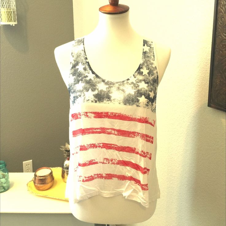 American Flag Top, White, A Racer Back, Vntage-Style Tank Top, Is So Cool, Distressed, And Ultra-Comfy! This American Flag Tank Can Go To The Beach, Gym, Or Picnic At The Park - Super Light-Weight And Soft With A Touch Of Retro Vibe. Throw This Red, White And Blue Tank Top On With Anything - It Will Look Equally Awesome Over Your Sports Bra And Workout Capris Or Swim Suit, Or Paired With Your Fave Cut-Offs! Pair This Retro, Vintage-Style Racer Back American Flag Tank With Anything!! American Flag Print Cotton Top For Beach, Spring Beach Tops With Flag Print, Red Flag Print Tank Top For Summer, Red Tank Top With Flag Print For Summer, Sleeveless Tops With American Flag Print For Spring, Patriotic Beach Tops With Flag Print, American Flag Print Cotton Tank Top For Summer, Trendy Summer Tops With Flag Print, Patriotic Sleeveless Tops For Spring