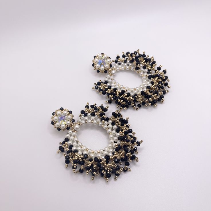 - Ships in 1 business day - 100% Handmade - Pearls, Black Crystal Beads, Gold Filled Metal - Measure: 3.5 Inches Length Long, 3 Inches Width - Weight: 1.6 Ounce (46 grams) the pair Beaded Teardrop Jewelry For Evening, Elegant Hoop Beaded Earrings For Pierced Ears, Elegant Hoop Beaded Earrings, Elegant Hoop Beaded Earrings For Party, Black Bridal Earrings For Party, Beaded Round Chandelier Earrings For Parties, Handmade Cluster Earrings For Party, Black Party Chandelier Earrings With Dangling Beads, Beaded Evening Earrings