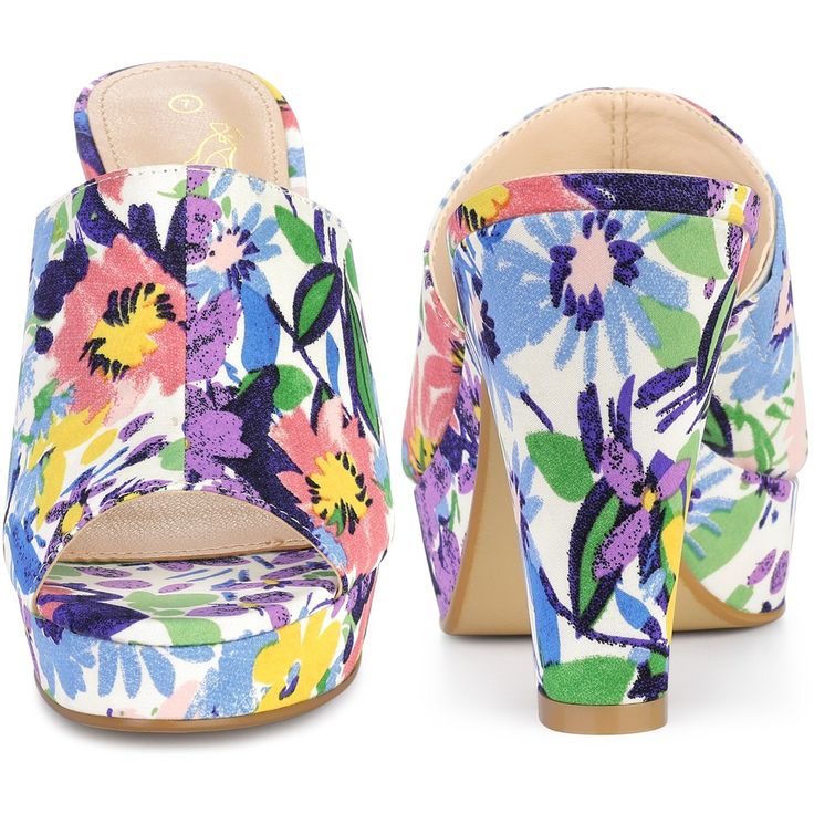 Looking for the perfect pair of summer sandals that will keep you both stylish and comfortable? Look no further than these must-have platform heel slides! Featuring an open-toe design, chunky block heels, and a beautiful floral cut-out design, these slip-on shoes are perfect for any summer activity. They are also lightly padded for added comfort, ensuring that your feet stay happy all day long. These classic shoes are versatile and can be worn with anything from jeans to dresses, making them a s Summer Open Toe Slides With Deep Heel Cup, Summer Slide Heels With Stacked Heel, Summer Platform Open Toe Slides, Summer Open Toe Platform Slippers With Padded Heel, Summer Beach Block Heels With Platform, Summer Platform Heels With Open Toe, Summer Beach Platform Block Heels, Summer Open Toe Platform Heels, Summer Platform Slippers With Padded Block Heel