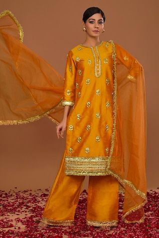 Peachy orange dupion kurta with gota embroidery. Comes with straight pant and an organza dupatta. - Aza Fashions Orange Cutdana Palazzo Set For Festivals, Semi-stitched Orange Palazzo Set With Gota Work, Orange Palazzo Set With Zari Work And Straight Kurta, Semi-stitched Orange Palazzo Set With Zari Work, Designer Orange Palazzo Set With Zari Work, Traditional Orange Palazzo Set With Gota Work, Festive Semi-stitched Palazzo Set In Orange, Festive Semi-stitched Orange Palazzo Set, Festive Orange Semi-stitched Palazzo Set