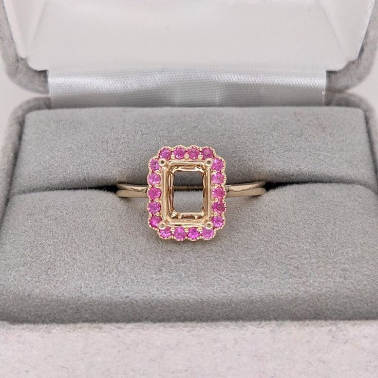 Discover a timeless classic with our Pink Sapphire Ring Semi Mount in Solid 14k Gold! This elegant emerald cut gemstone will make a stunning statement piece that will last for generations. With meticulous milgrain detail, this exquisite ring is the perfect way to show your love forever. 14k Gold Emerald-cut Birthstone Ring With Diamond Cut, 14k Gold Emerald Cut Diamond Birthstone Ring, 14k Gold Birthstone Ring With Emerald Cut Diamond, Emerald Cut Ruby Ring In Gold, Gold Sapphire Ring With Emerald Cut And Halo Setting, Yellow Gold Emerald-cut Sapphire Ring With Accent Stones, Gold Ruby Ring With Emerald Cut And Accent Stones, Emerald Cut Ruby Ring In Yellow Gold, Yellow Gold Octagon Ring With Halo Setting