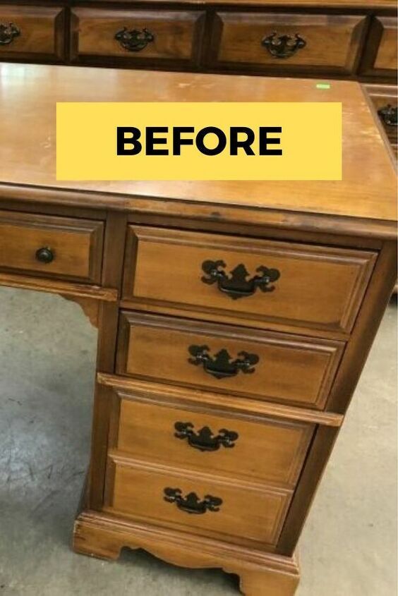 an old desk has been refinished with new paint and waxing to look like wood