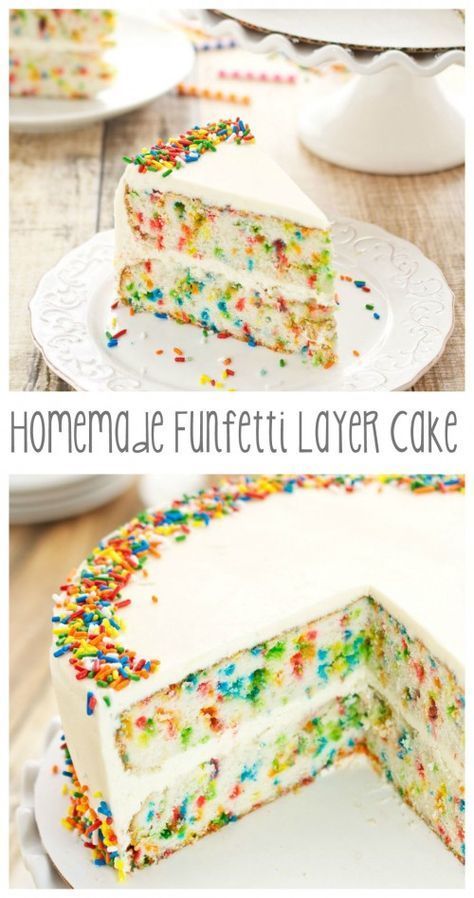 a cake with white frosting and sprinkles on it, cut in half