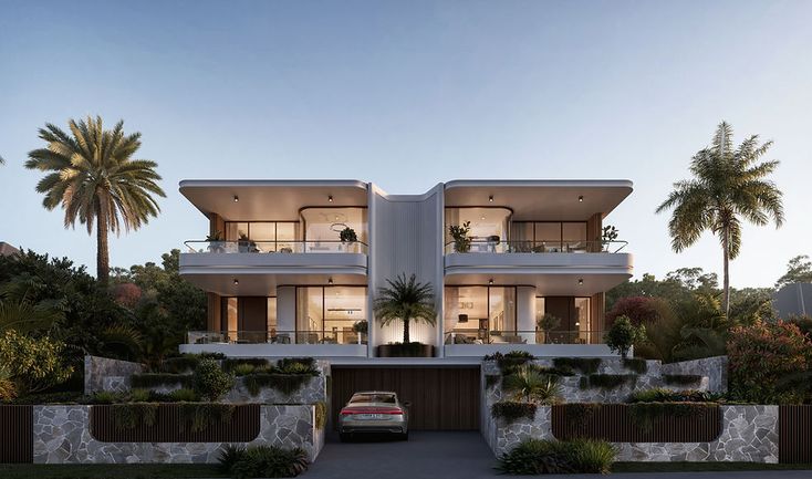 a car is parked in front of a two story house with palm trees on the other side