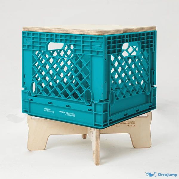 a blue crate sitting on top of a wooden stand