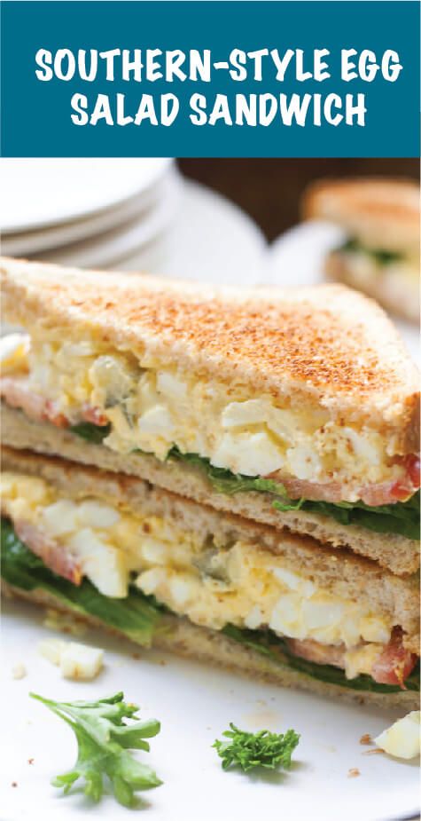 a sandwich cut in half sitting on top of a white plate