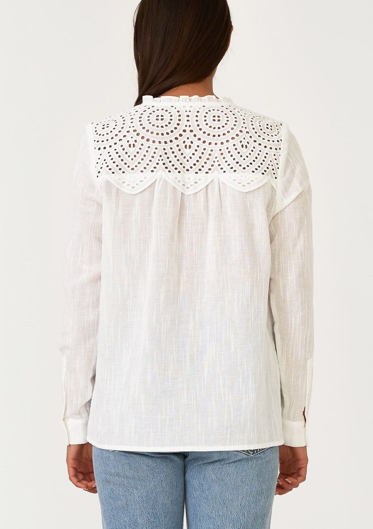 An ultra-pretty bohemian blouse with long sleeves and a sheer eyelet lace yoke detail. Cotton eyelet lace yoke Relaxed fit Long sleeve Button cuff closure Ruffled round neckline Self-covered button front Bohemian spring blouse A sheer eyelet lace yoke detail adds a feminine touch to this timeless bohemian blouse. With long sleeves, a self-covered button front, and a ruffle-trimmed round neckline. Perfect for the office or the weekend, this versatile style pairs well with denim. Model is 5'9, wea Casual Long Sleeve Lace Top With Lace Collar, Casual Long Sleeve Lace Trim Top, Casual Long Sleeve Tops With Lace Cuffs, Long Sleeve Cotton Lace Top With Lace Trim, Long Sleeve Broderie Anglaise Blouse For Fall, Long Sleeve Blouse With Lace Trim For Daywear, Fall Long Sleeve Broderie Anglaise Blouse, Long Sleeve Lace Top For Daywear, Cotton Eyelet Long Sleeve Tops