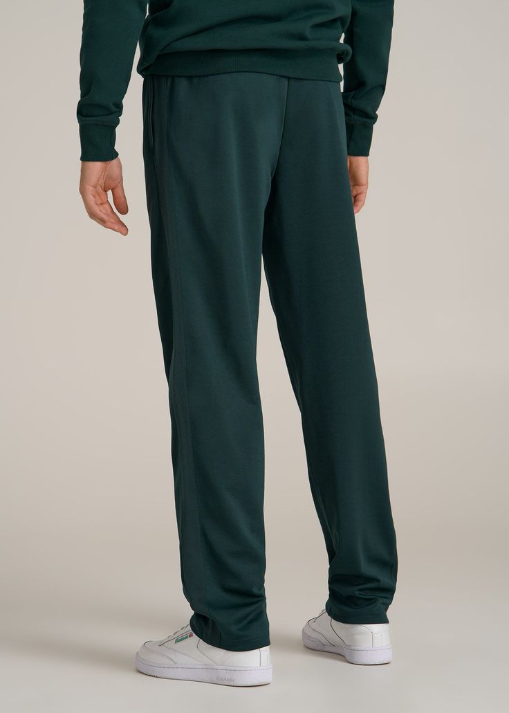 Track Pants Made for the Long-Legged Runner Hit Your Stride For the tall man who never slows down, our Tricot Extra-Long Track Pants are here to keep up. Whether you're sprinting on the track or sprinting through errands, these men's tall active pants offer the stretch and comfort you need to move freely. The mid-rise fit ensures they sit comfortably, while the internal drawstring keeps them secure. Pre-washed to maintain size and quality, these are the athletic pants for tall men you'll reach f Scrubs Dress, Athleisure Summer, Cozy Sleepwear, Track Pants Mens, Tall Man, Tall Men, Extra Mile, Sports Blazer, Long Sleeve Tee Shirts