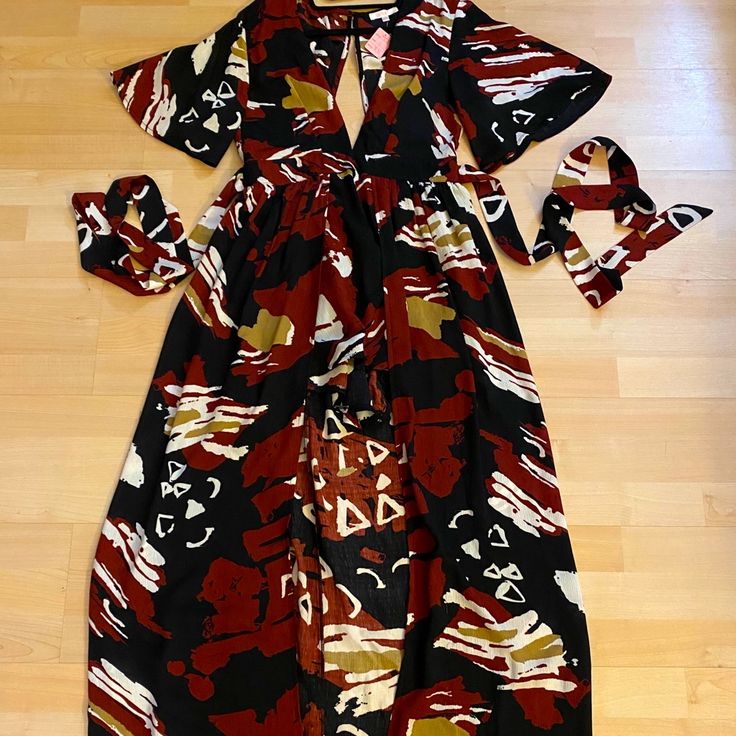 Gorgeous Print And A High-Low Faux-Wrap Skirt. Attached Faux-Wrap High-Low Skirt With Tie Deep V-Neck And V-Back; Hidden Back Zipper Closure Found This One Of A Kind Piece In La On A Business Trip, But Unfortunately It Was Too Big :( Chic Wrap Dress For Brunch, Black Wrap Dress For Night Out, Flowy Wrap Dress For Date Night, Black Wrap Dress For Date Night, Chic Flowy Wrap Maxi Dress, Faux Wrap Dress For Night Out In Summer, Chic Wrap Dress For Day Out, Black Wrap Dress With Tie Waist, Summer Night Out Faux Wrap Dress