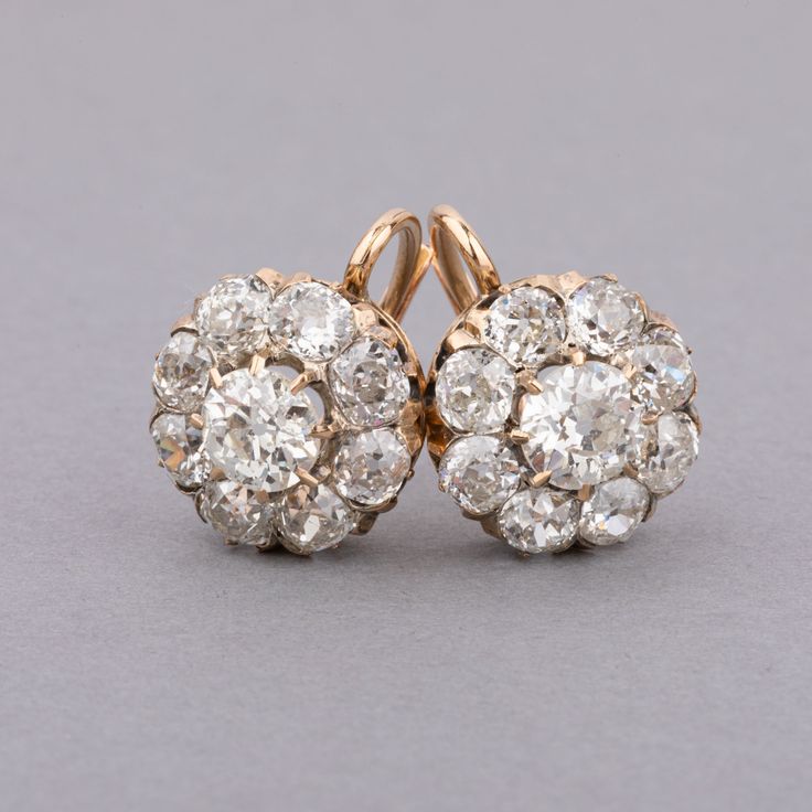 One very beautiful pair of antique diamonds earrings, made in France circa 1880. Made in yellow gold 18k and set with 5.60 carats approximately of Old European cut diamonds. The central ones weights 0.80 carats approximately. The quality is good, white color and good clarity. Antique Diamond Earrings, Vintage Diamond Earrings, Diamonds Earrings, French Retro, Retro Ring, White Gold Set, Baguette Cut Diamond, Cushion Cut Diamonds, French Antique