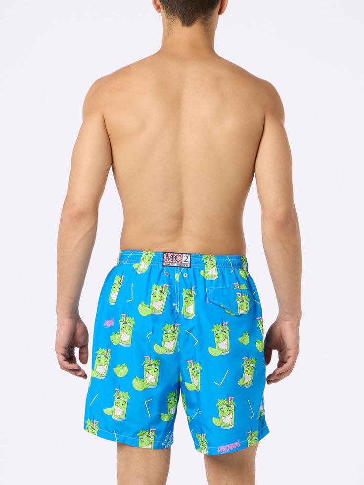 Man Lighting mid-length swim shorts are designed with a lightweight fabric that dries quickly, earning their name Lighting. The elasticized waistband and drawstring closure with branded terminals ensure a comfortable fit, while the branded eyelets are strategically placed to drain water and prevent the shorts from ballooning. Featuring side pockets with French seams and a back patch pocket with a magnetic closure, these swim shorts are both practical and stylish. Additionally, there's a small internal coin pocket for added convenience. The all-over print adds a touch of flair to this versatile swimwear option. The shorts can be neatly folded and stored in the rear pocket when not in use. Crafted from 100% recycled polyester, these shorts reflect our commitment to sustainability. Man Lighti Playful Bottoms With Elastic Waistband For Pool, Playful Swim Trunks With Elastic Waistband For Poolside, Playful Swim Shorts For Pool, Playful Short Swim Trunks For Swimming, Playful Bottoms With Built-in Shorts For Pool, Playful Short Swim Bottoms, Playful Sports Bottoms For Beach Season, Playful Stretch Shorts For Swimming, Playful Green Shorts For Poolside